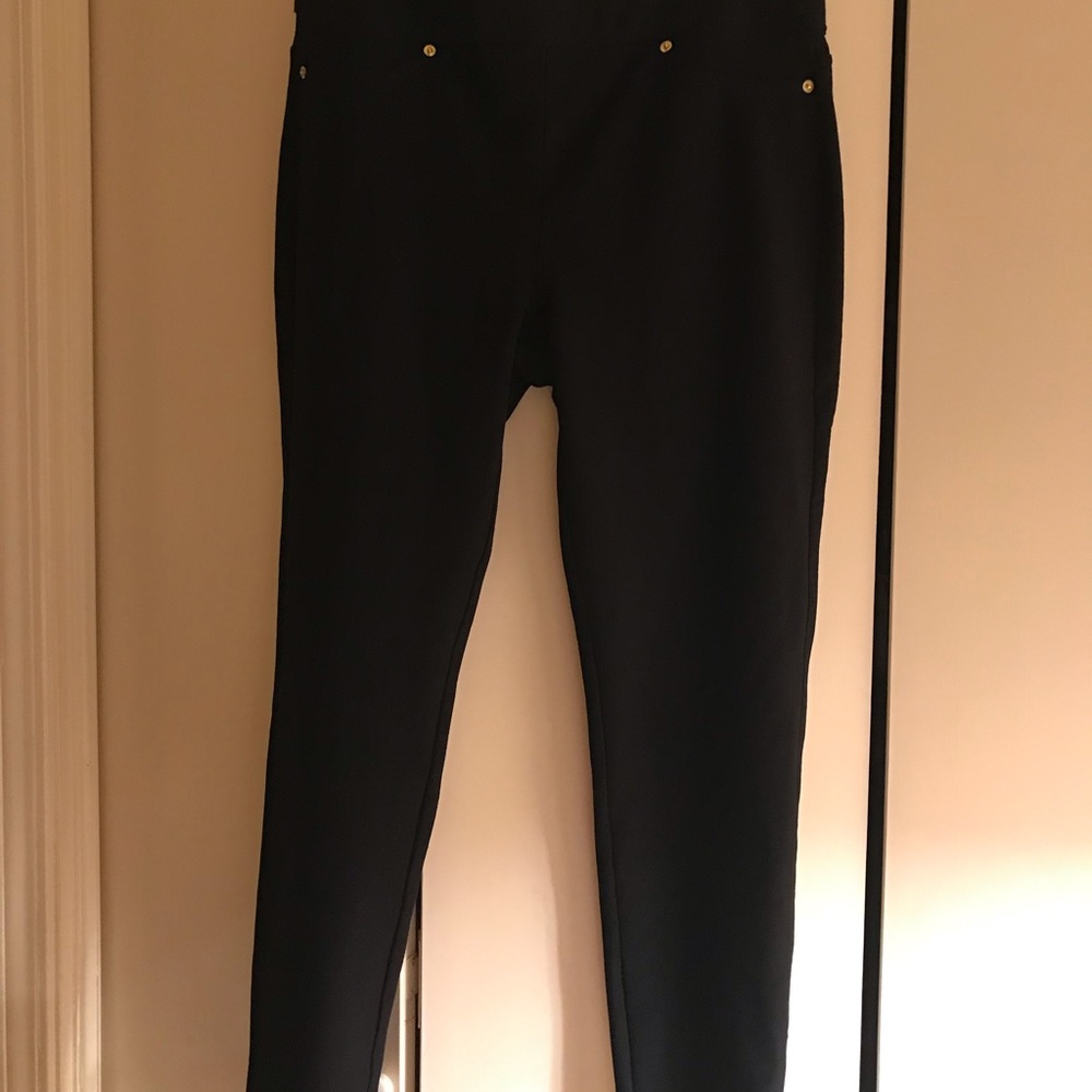 Black form fitting pants